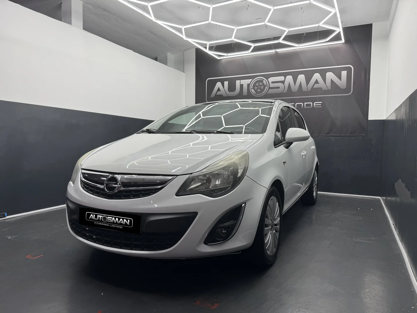 OPEL Corsa 1.4 Selective 2013 Gasolina Blanco - Vista lateral